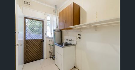 Freshly Painted 3-Bedroom Home on a Large Block - Photo 5