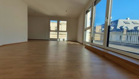 Beeindruckende Neubau Dachterrassenwohnung in Toplage mit Garage! - Photo 2