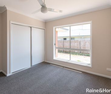 Well presented 4 bedroom family home - Photo 6