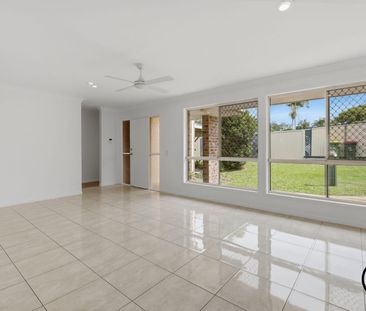 Freshly Updated Dual Living Home with Pool in Prime Carrara Location - Photo 1