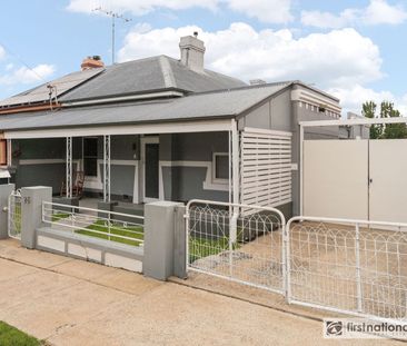 Stylish & Convenient Three Bedroom Home - Photo 2