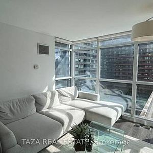 Feels brand new entertainment district + den parking included! - Photo 2