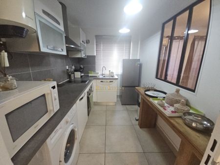 Location Appartement 2 pièces 48m² ST DENIS 97400 - Photo 4