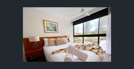 Stylish Fully Furnished 1-Bedroom Apartment in the Heart of Surfers Paradise - Photo 3