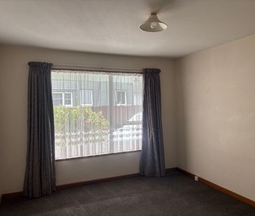 Spacious, Two-Bedroom Unit in Prime Location on a beautiful section - Photo 1