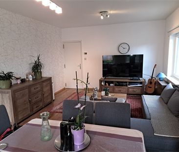 Een appartement op de eerste verdieping met garage en tuintje - Foto 2