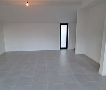 Een nieuwbouw appartement op de eerste verdieping met terras - Photo 5