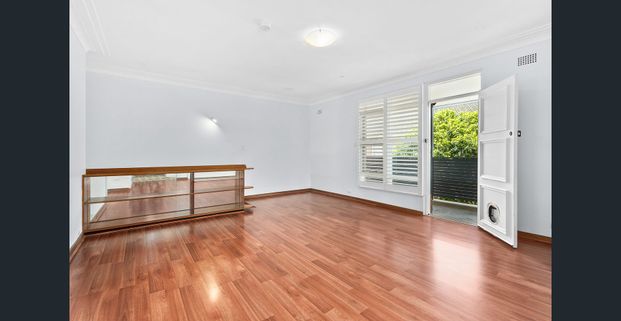 Perfectly positioned two bedroom apartment - Photo 1
