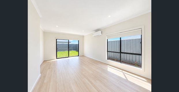 BRAND NEW 4-BEDROOM HOME WITH QUALITY FEATURES - Photo 1