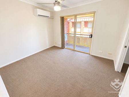 Three-Bedroom Townhouse with Resort-Style Facilities in Central Bundall - Photo 4
