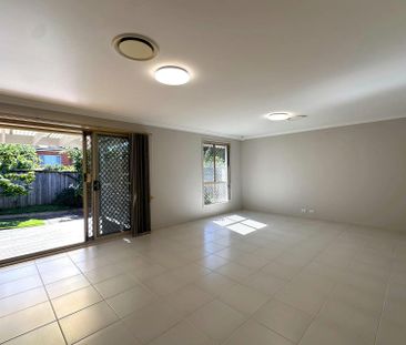 SPACIOUS FAMILY LIVING IN A QUIET AND CONVENIENT LOCATION - Photo 1