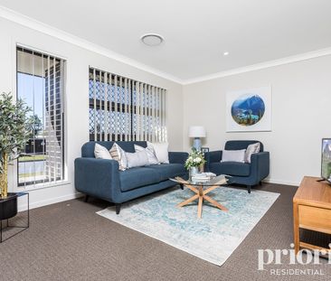 Spacious and modern lowset across from parkland - Photo 1