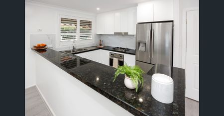 Light Filled Stylish Single Level Family Home - Photo 2