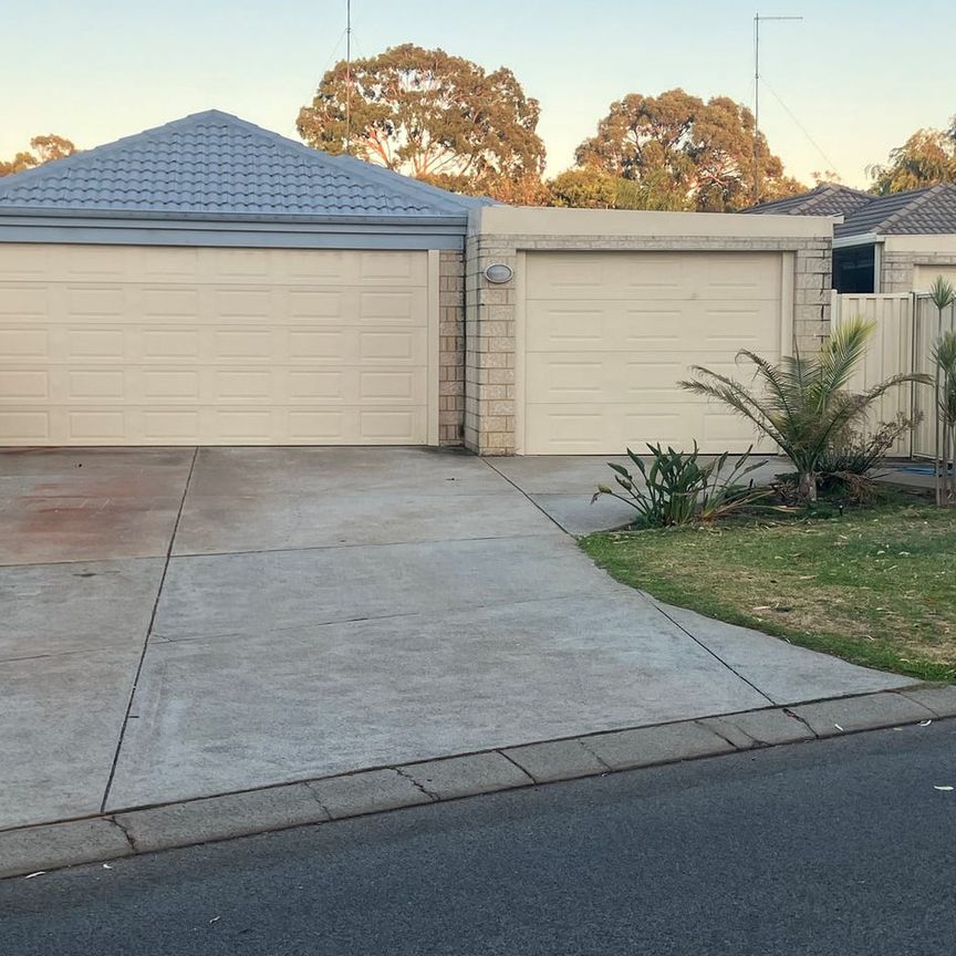 Charming, Secure 4-Bedroom, 2-Bathroom Home, Featuring Triple Garage with Extra Parking & Entertainer's Patio - Photo 1