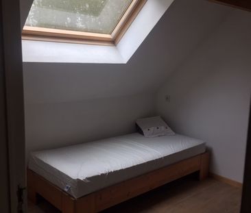 Kamer in een dakppartement te huur - Photo 1