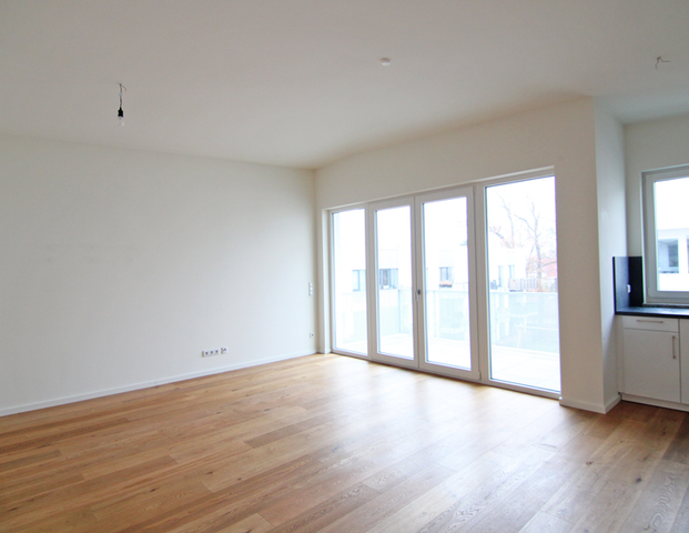 Familientraum mit allen Extras: hochwertige Designwohnung mit EBK, TG/Wallbox und Balkon! - Photo 1