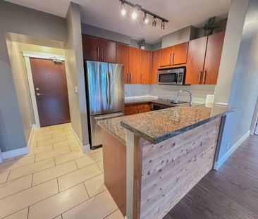 Bright 2 Bedroom Condo In Victoria Hill With Ac & Underground Parking - Photo 1