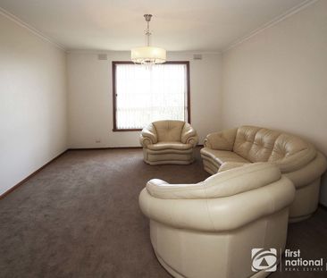 Sitting Amongst the Flowers - Photo 1