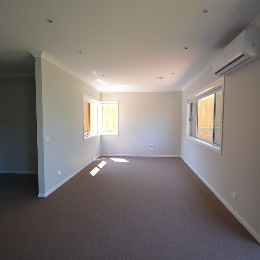 Modern & Low-Maintenance Home with Double Garage - Photo 1