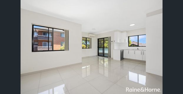 Stylish and Spacious Two Bedroom Unit - Photo 1