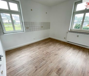 Helle 2-Raum-Wohnung im 1. Obergeschoss in Gornsdorf! - Photo 2