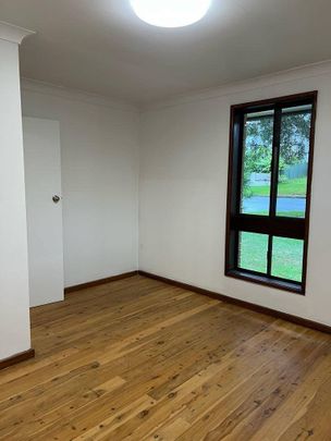 Spacious 4-Bedroom Home in Prime West Wollongong Location - Photo 1