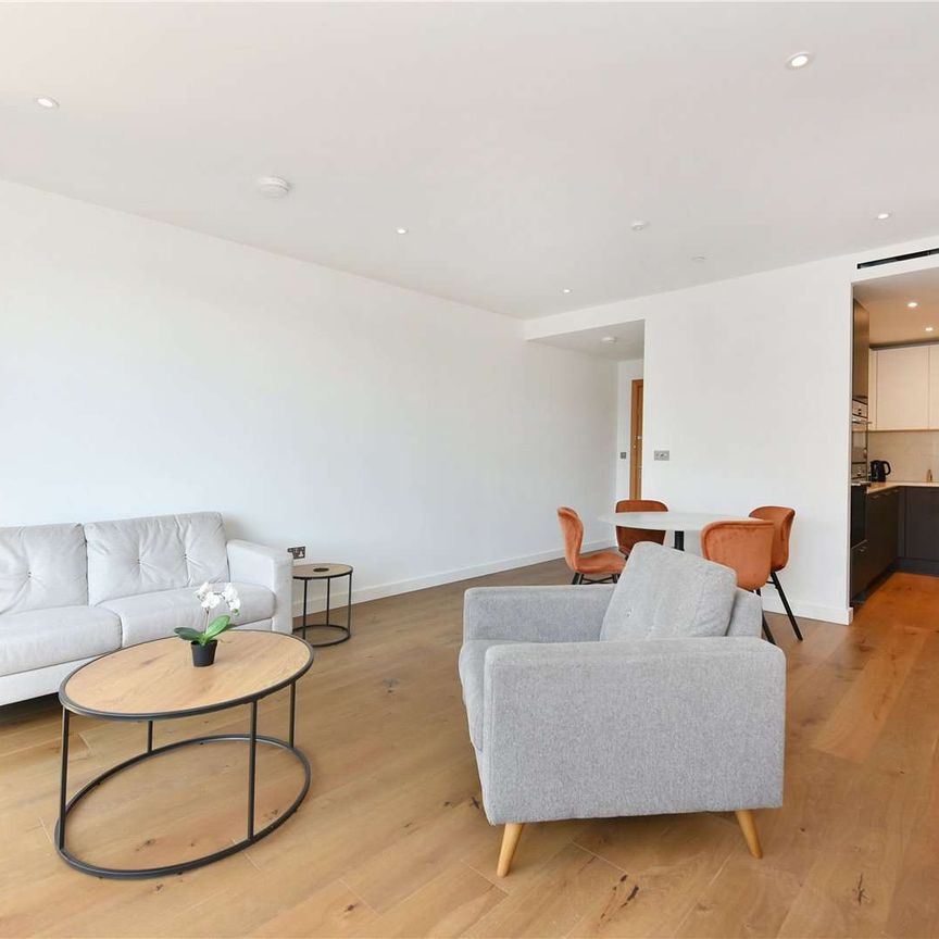 A bright two bedroom two bathroom apartment with direct access to a private balcony - Photo 1