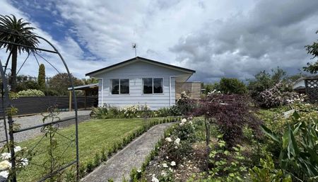 Private, Peaceful and Picture-Perfect — 3 Bedrooms + Large Carport - Photo 5