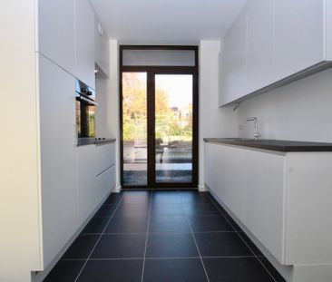 Gelijkvloers nieuwbouwappartement met zonnig terras! - Photo 1