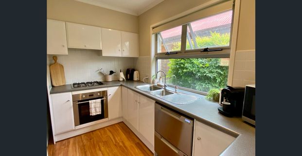 Comfortable and Convenient 3-Bedroom House with Indoor Spa and Outdoor Entertainment Area - Photo 1