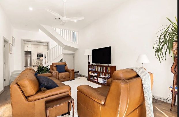 Newly Renovated Family Home with Spacious Layout and Multipurpose Backyard Retreat - Photo 1