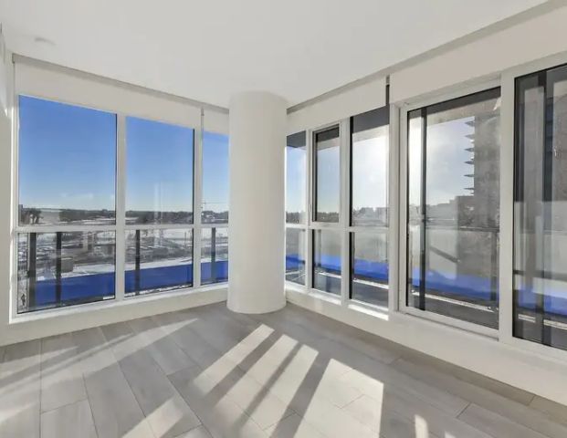 Sunny 2 Bedroom Corner Unit | 404 - 615 6 Ave SE, Calgary - Photo 1