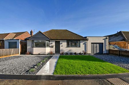 This versatile bungalow includes three bedrooms, principal with dressing room and ensuite, a stunning open plan kitchen with bi-fold doors, and a garden with a heated studio and WC. - Photo 4