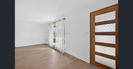 Open the door to coastal living - Photo 2