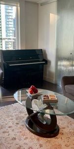 $3,590/ Beautiful spacious 2 bed 2 bath condo with floor to ceiling windows (Dow - Photo 3