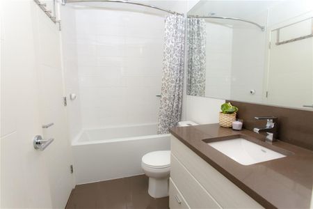 Spacious One Bedroom Corner Unit by New Skytrain Station - Photo 2