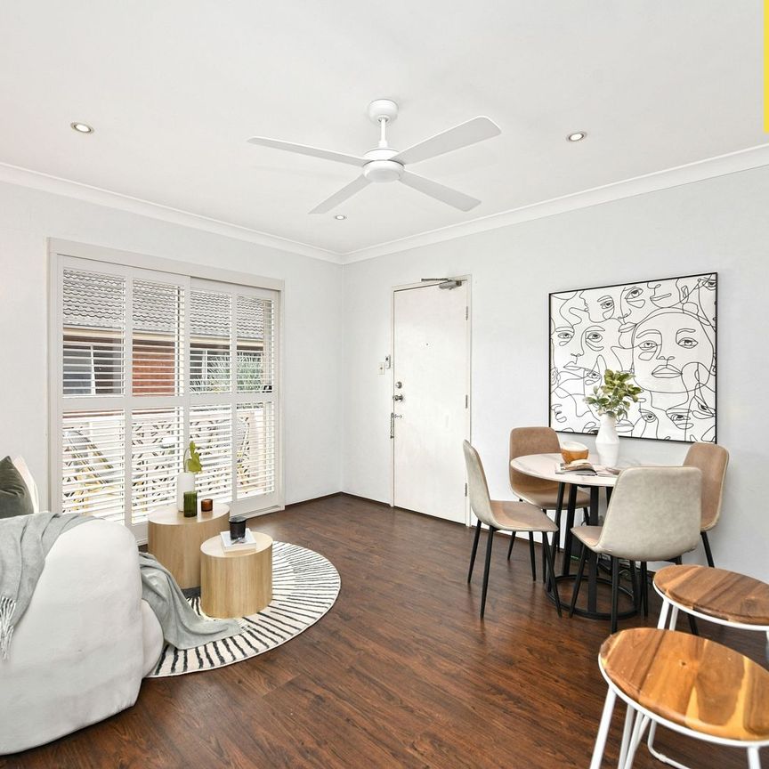 Stylish & Sun-Filled Living in a Convenient Location - Photo 1