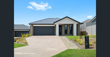 Modern Family Living in the Heart of Gregory Hills - Photo 5