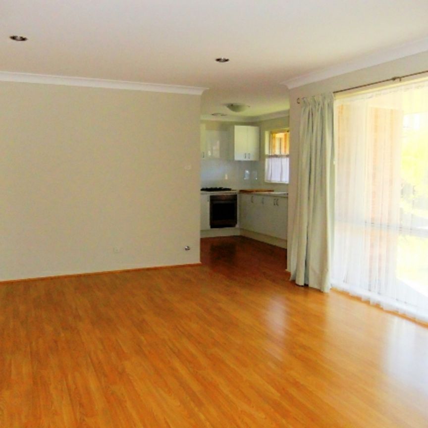 Neat and Tidy Duplex - Lawn Maintenance Included! - Photo 1