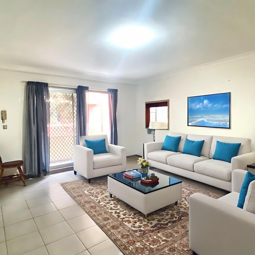 GOOD SIZED 2 BEDROOM UNIT 350M TO AUBURN STATION - Photo 1