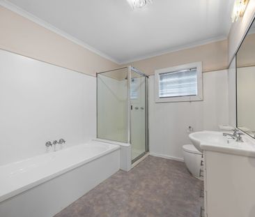 Charming Golden Point Home with Extra Toilet and Spacious Living - Photo 6