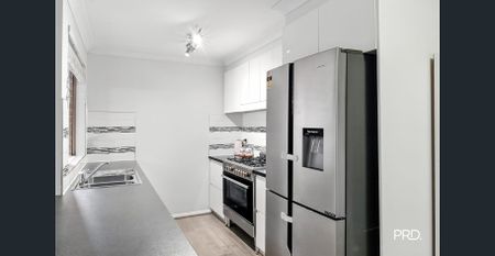 Modern Family Home with Multiple Living Areas - Photo 3