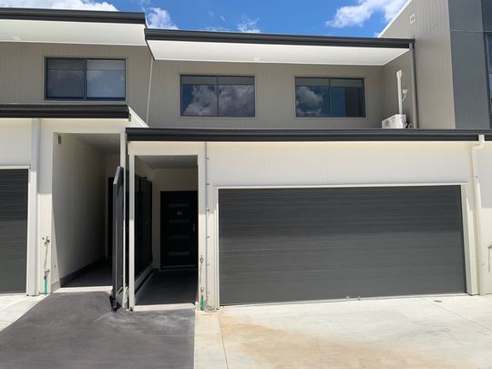 BRAND NEW THREE BEDROOM TOWNHOUSE IN AN ELEVATED POSITION - Photo 1