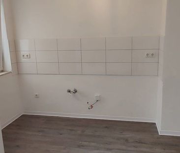 Renovierte 2,5-Zimmer-Wohnung mit Balkon in ruhiger Wohnanlage! - Photo 4