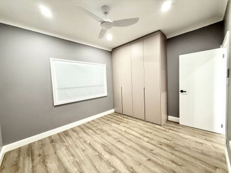 Fully Renovated Three-Bedroom Home with Carport Parking - Photo 5