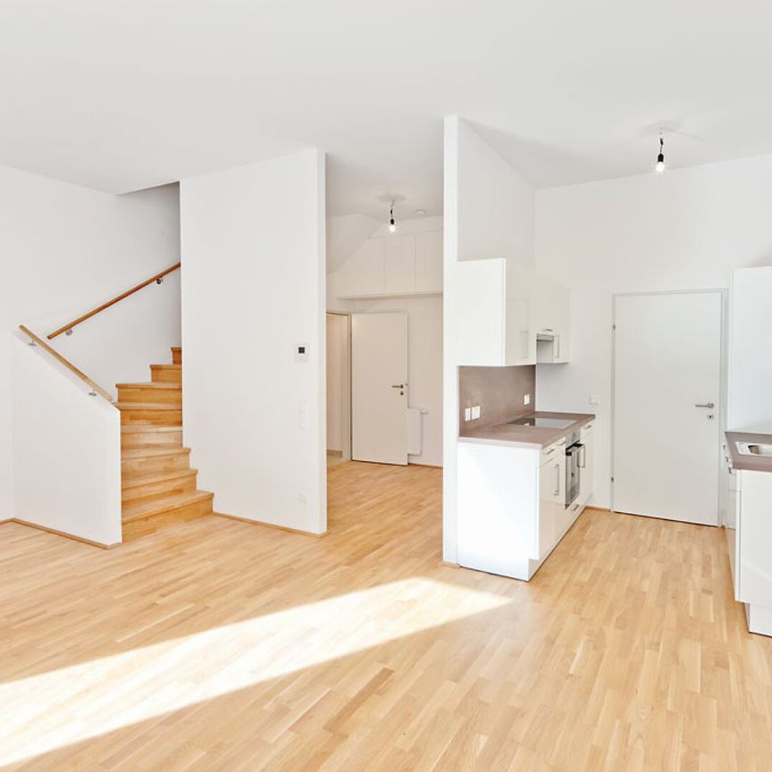 Maisonettewohnung mit ruhigen und großen Garten - Foto 1