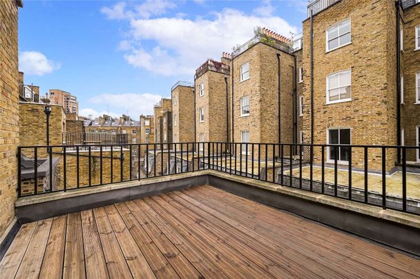 A charming third floor period conversion in a prime South Kensington location, boasting plenty of natural light and a private terrace. - Photo 1