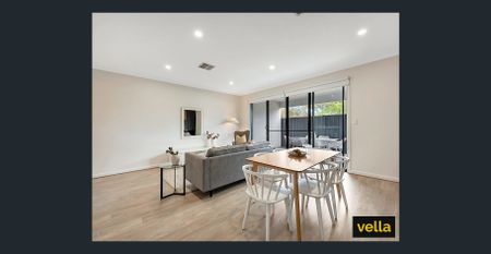 Modern, stylish, low maintenance living at its finest! - Photo 2