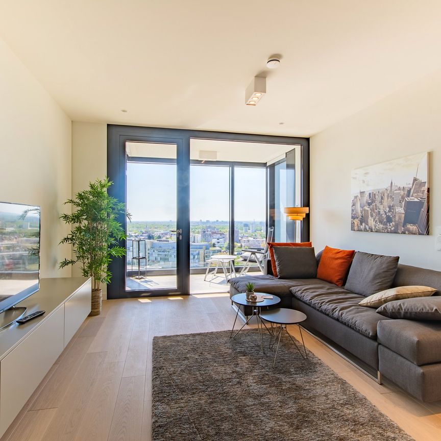 City-Residence: High-End-Wohnung (15.Stock) in spektakulärem Wohnturm - Photo 1