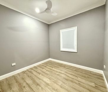 Fully Renovated Three-Bedroom Home with Carport Parking - Photo 2